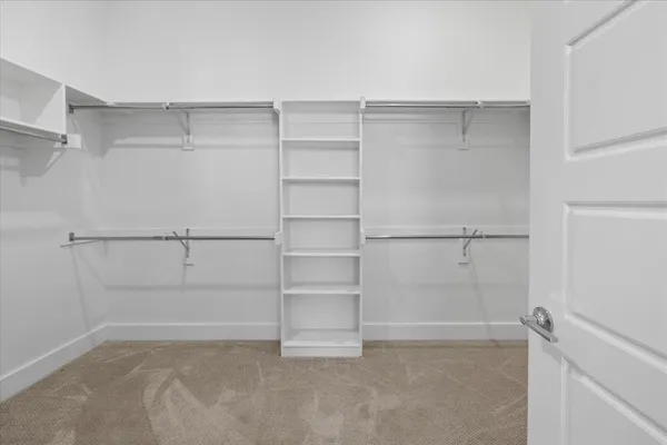 a view of an empty walk in closet