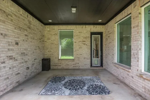 a view of a entryway door of a house