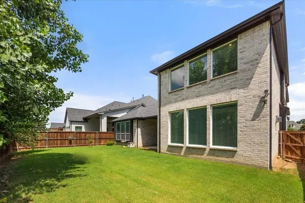 a view of outdoor space yard and front view of house