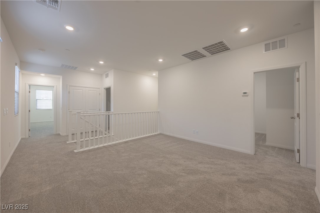 95 Silver Run Lane Las Vegas, NV 89138 - Photo 6 of 18 Spare room featuring recessed lighting and light colored carpet