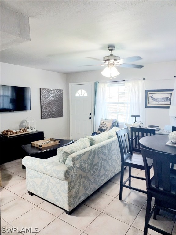 101 Oregon Road North Lehigh Acres, FL 33936 - Photo 37 of 41 a bedroom with a bed and a chandelier