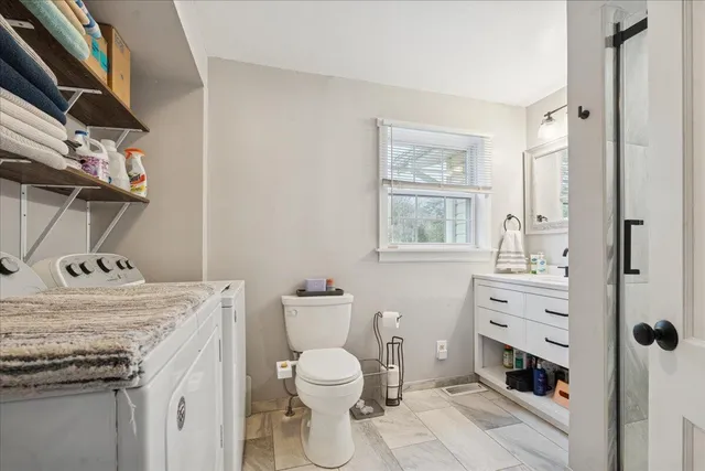 a view of a garden with a building