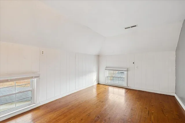 a view of wooden floor with a dry yard