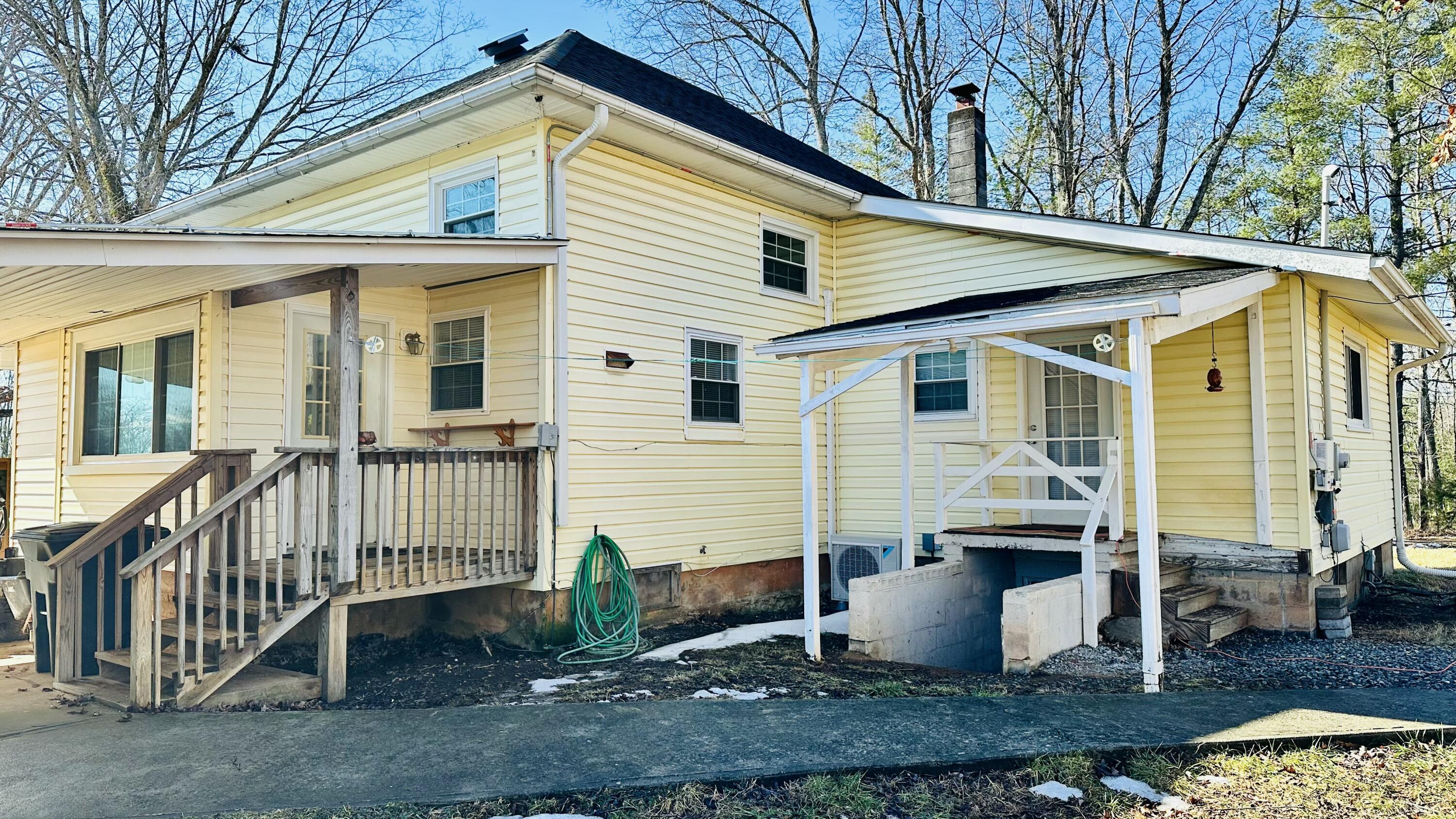 5930 Edwardsville Road Hardy, VA 24101 - Photo 47 of 63 a view of a house with a yard and wooden fence