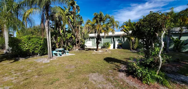 a view of a building with a tree