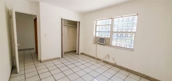 a view of an empty room with window