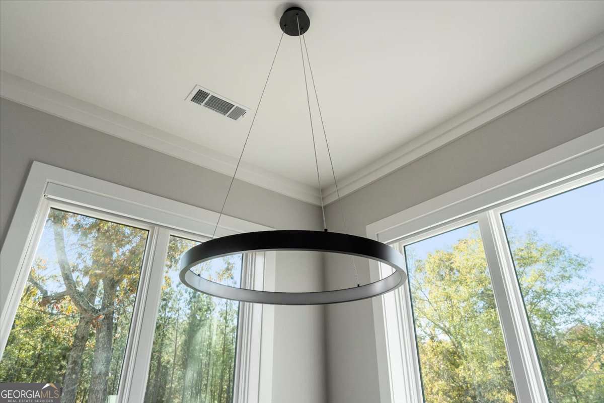 60 Stephens Road Lexington, GA 30648 - Photo 17 of 60 a room with window and stairs