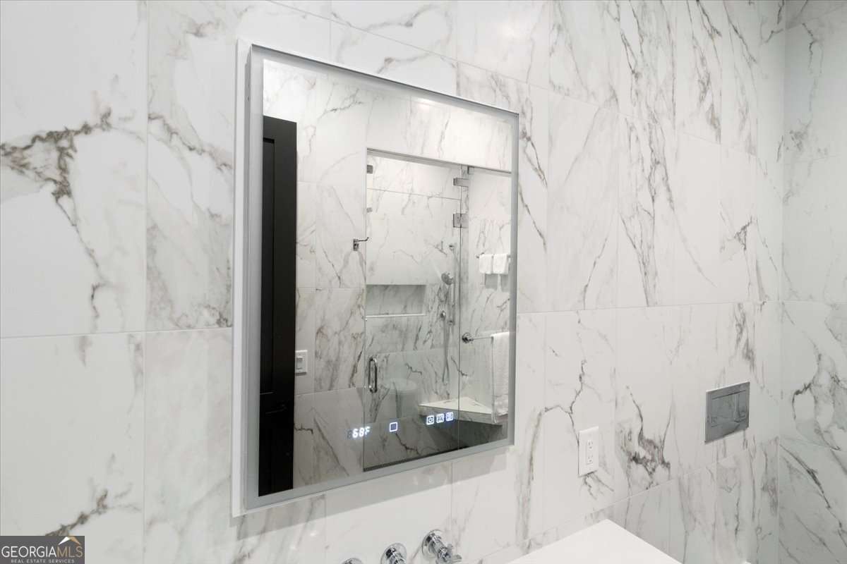 60 Stephens Road Lexington, GA 30648 - Photo 33 of 60 a bathroom with a shower and a sink