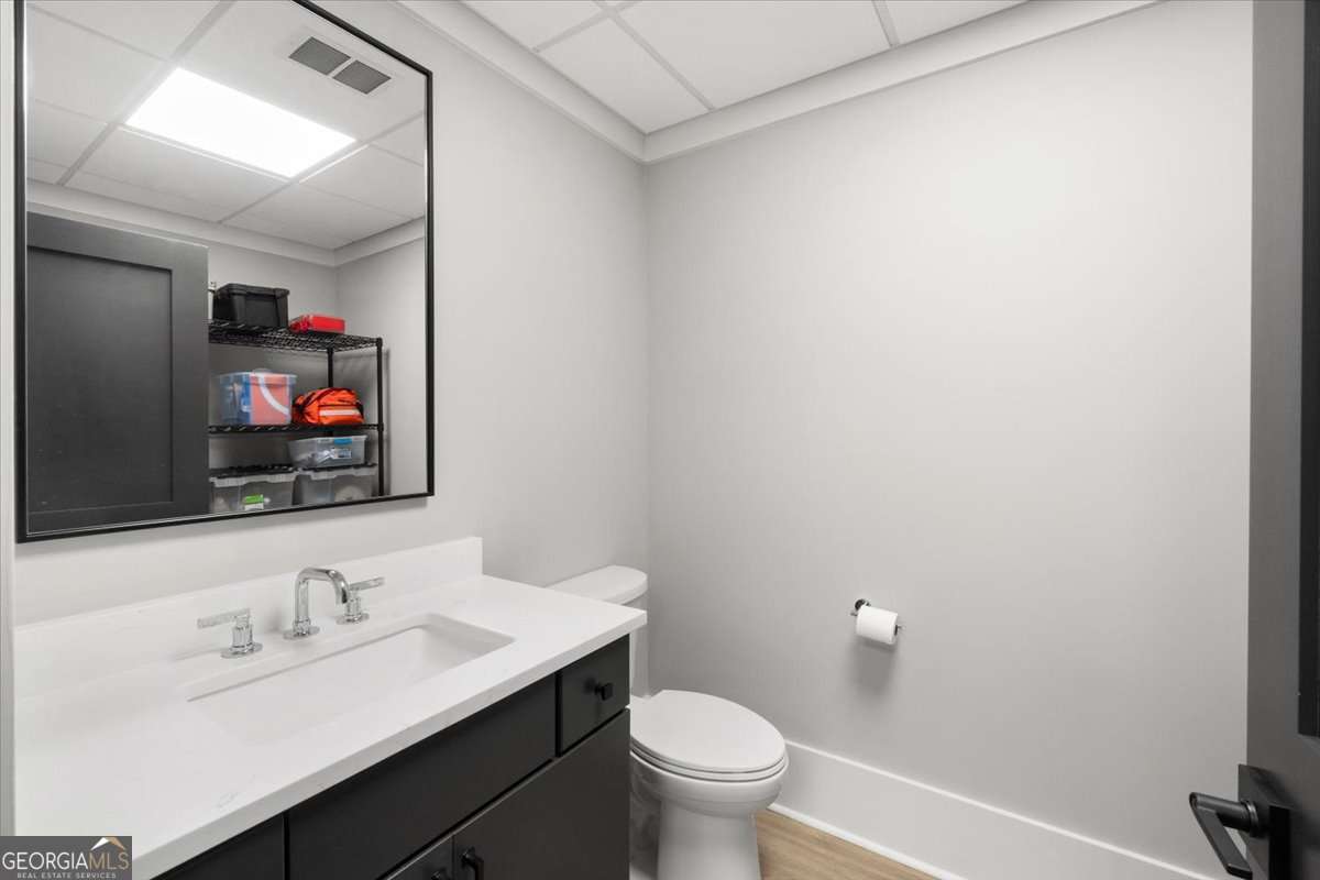 60 Stephens Road Lexington, GA 30648 - Photo 41 of 60 a bathroom with a toilet a sink and mirror