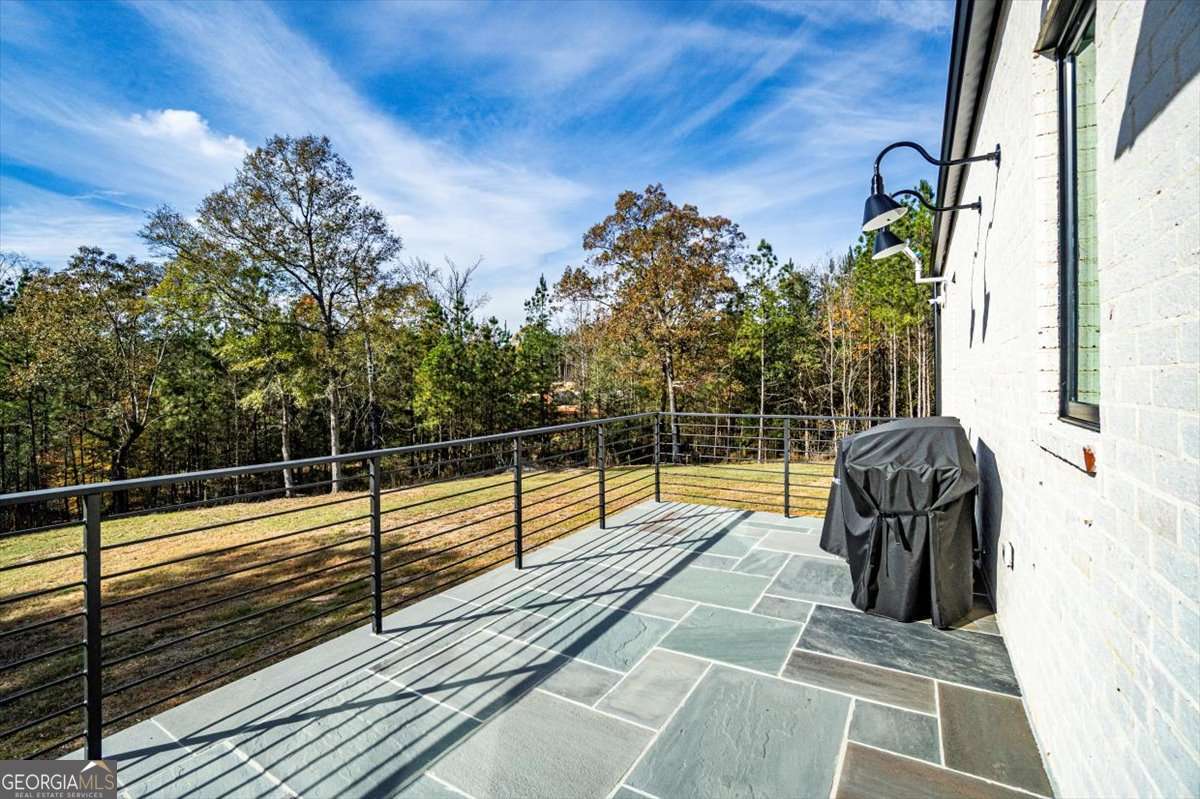 60 Stephens Road Lexington, GA 30648 - Photo 45 of 60 a view of a balcony with dining area