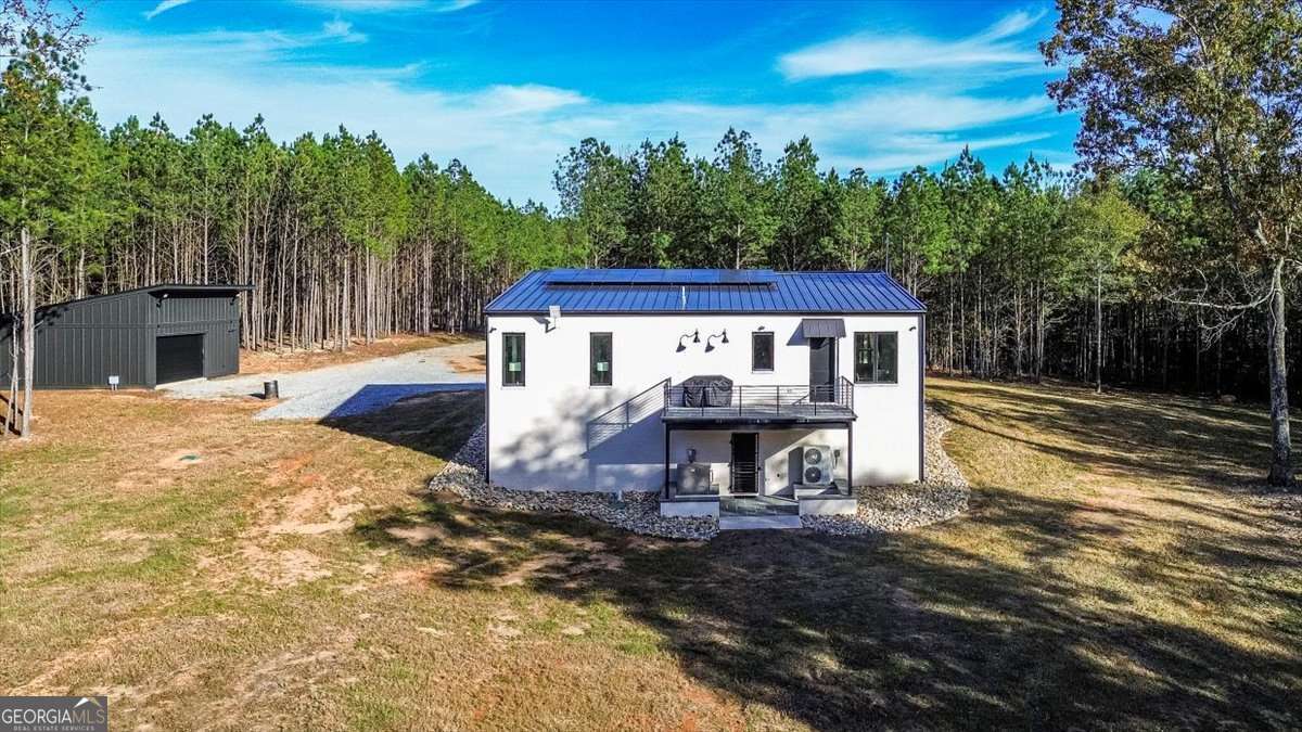 60 Stephens Road Lexington, GA 30648 - Photo 47 of 60 a view of a house with backyard and sitting area