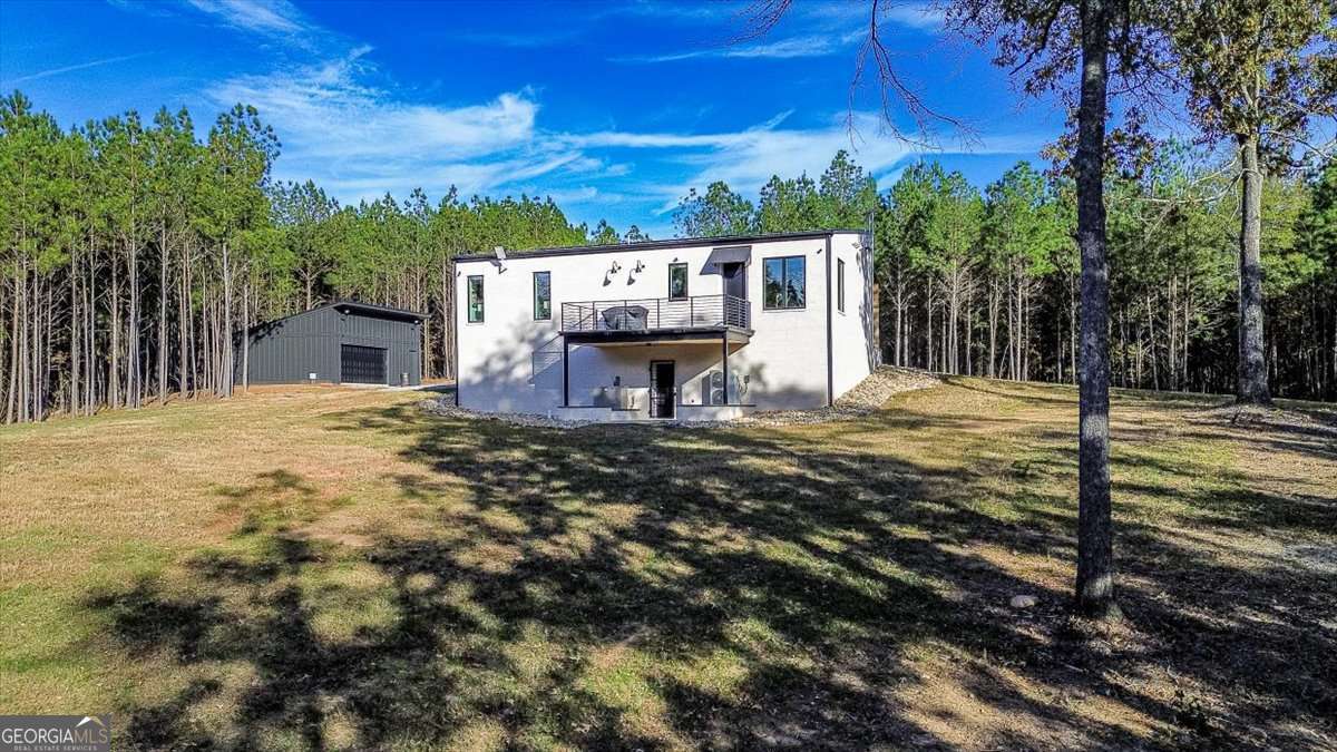 60 Stephens Road Lexington, GA 30648 - Photo 48 of 60 a view of a water fountain with an outdoor space