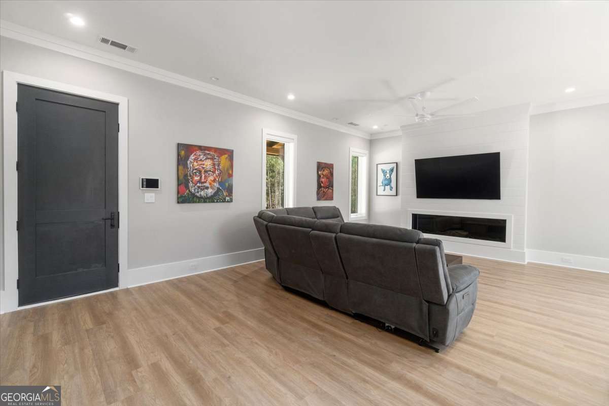 60 Stephens Road Lexington, GA 30648 - Photo 5 of 60 a living room with furniture and a flat screen tv