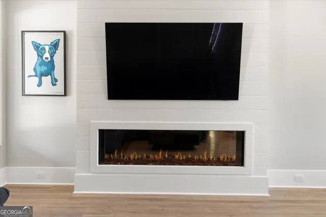 a living room with a fireplace