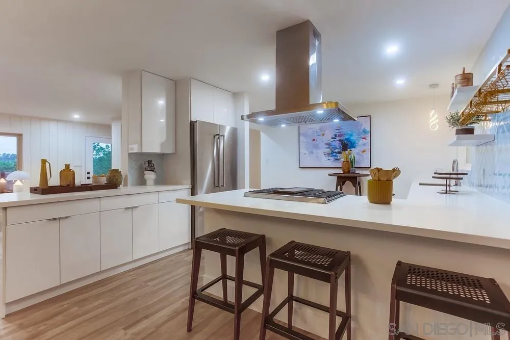 1822 Ivy Road Oceanside, CA 92054 - Photo 15 of 30 a kitchen with stainless steel appliances a sink and a refrigerator