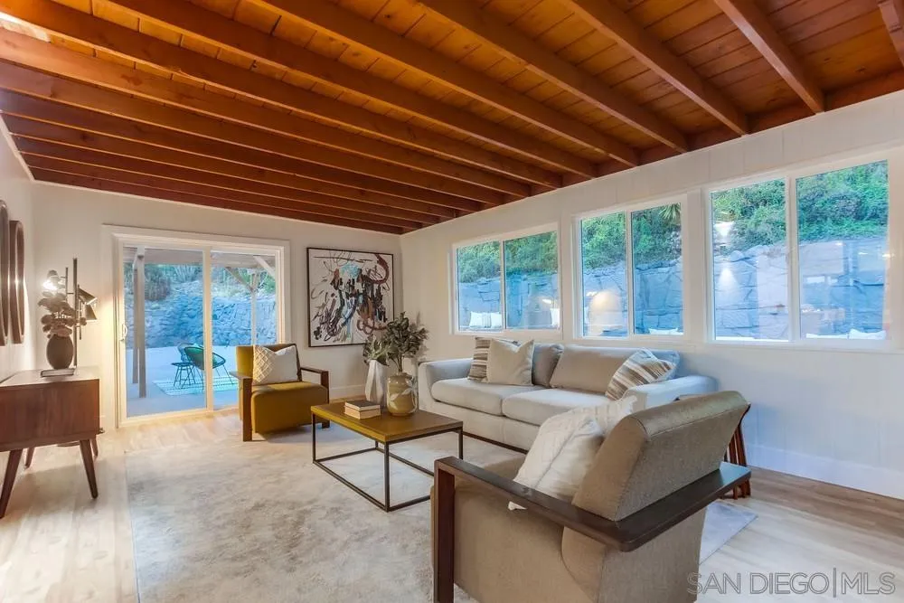 1822 Ivy Road Oceanside, CA 92054 - Photo 17 of 30 a living room with furniture and a large window