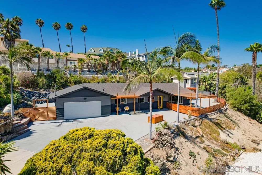 1822 Ivy Road Oceanside, CA 92054 - Photo 2 of 30 a swimming pool with a yard