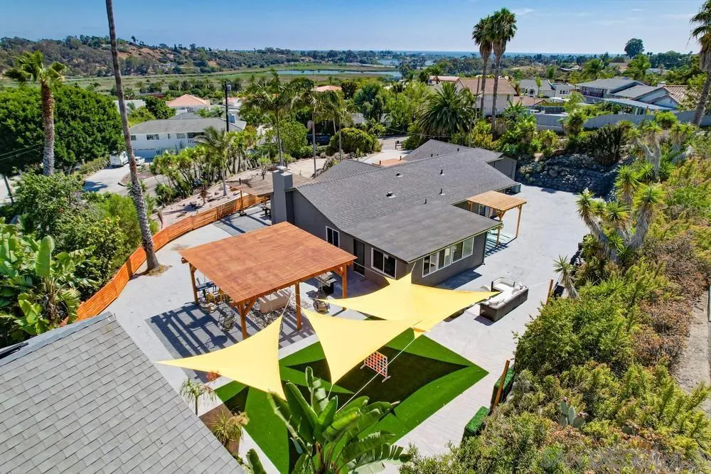 1822 Ivy Road Oceanside, CA 92054 - Photo 3 of 30 an aerial view of a house with outdoor space and a lake view