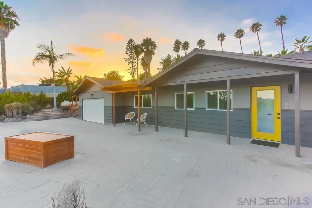 1822 Ivy Road Oceanside, CA 92054 - Photo 4 of 30 a view of a house with a backyard and a tree