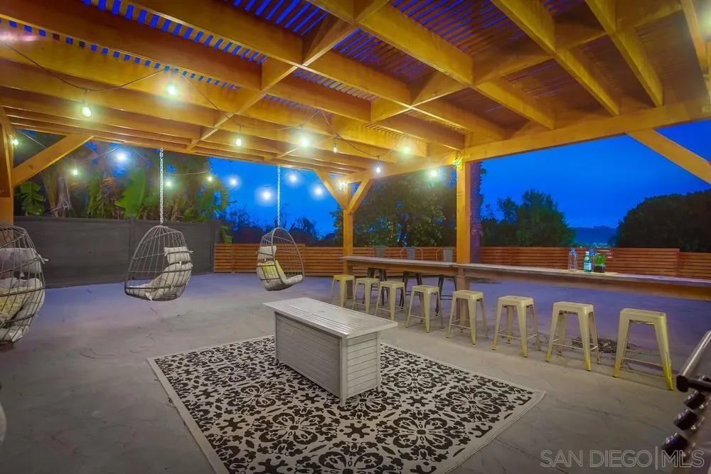 1822 Ivy Road Oceanside, CA 92054 - Photo 7 of 30 a outdoor space with lots of white furniture