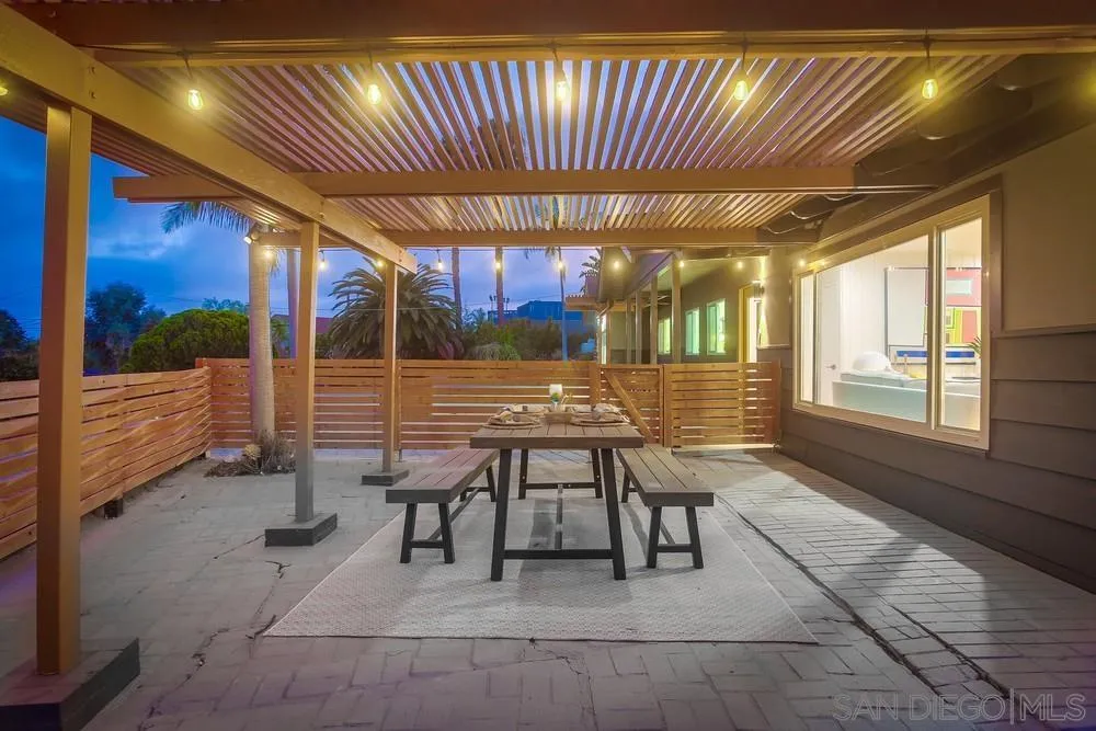 1822 Ivy Road Oceanside, CA 92054 - Photo 9 of 30 a patio with table and chairs