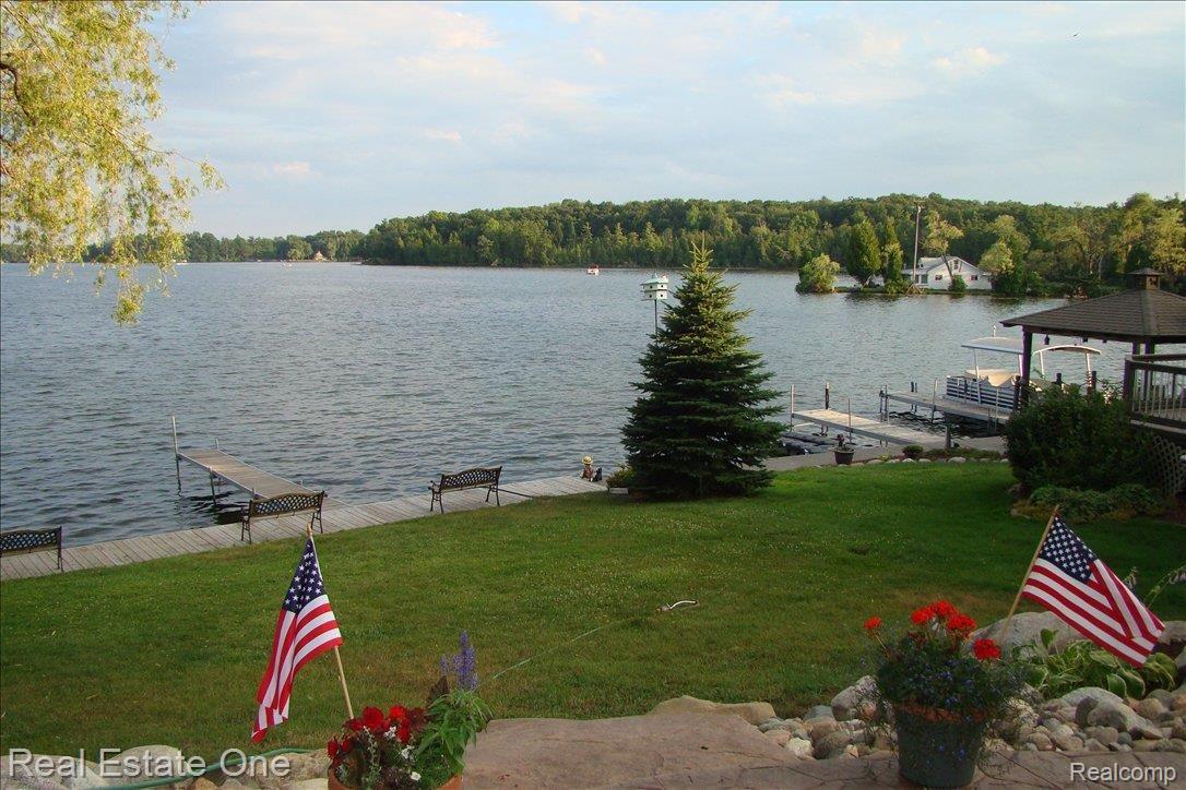 665 Gravel Ridge Road Leonard, MI 48367 - Photo 6 of 17 VIEW OF LAKE FROM REAR PATIO