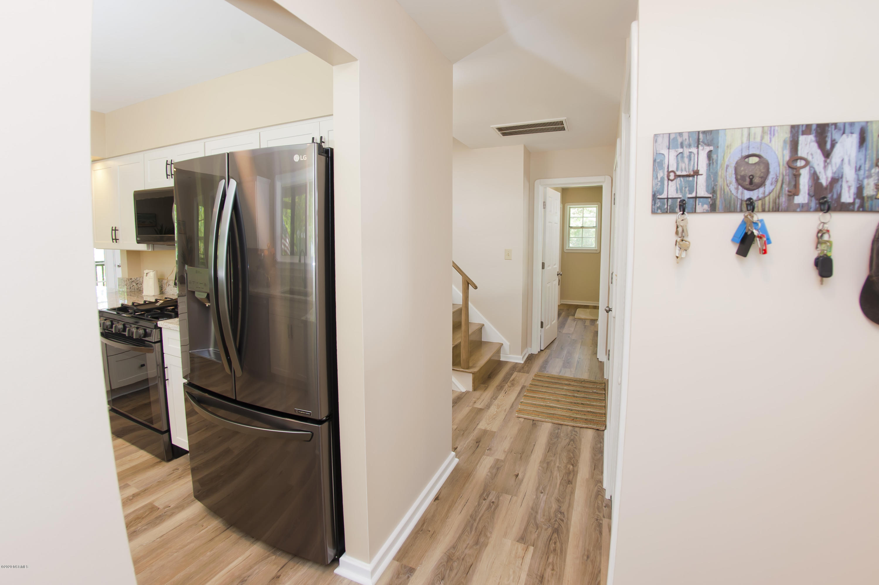 6413 Florence Road Merritt, NC 28556 - Photo 71 of 90 Hallway + Entrance to Kitchen