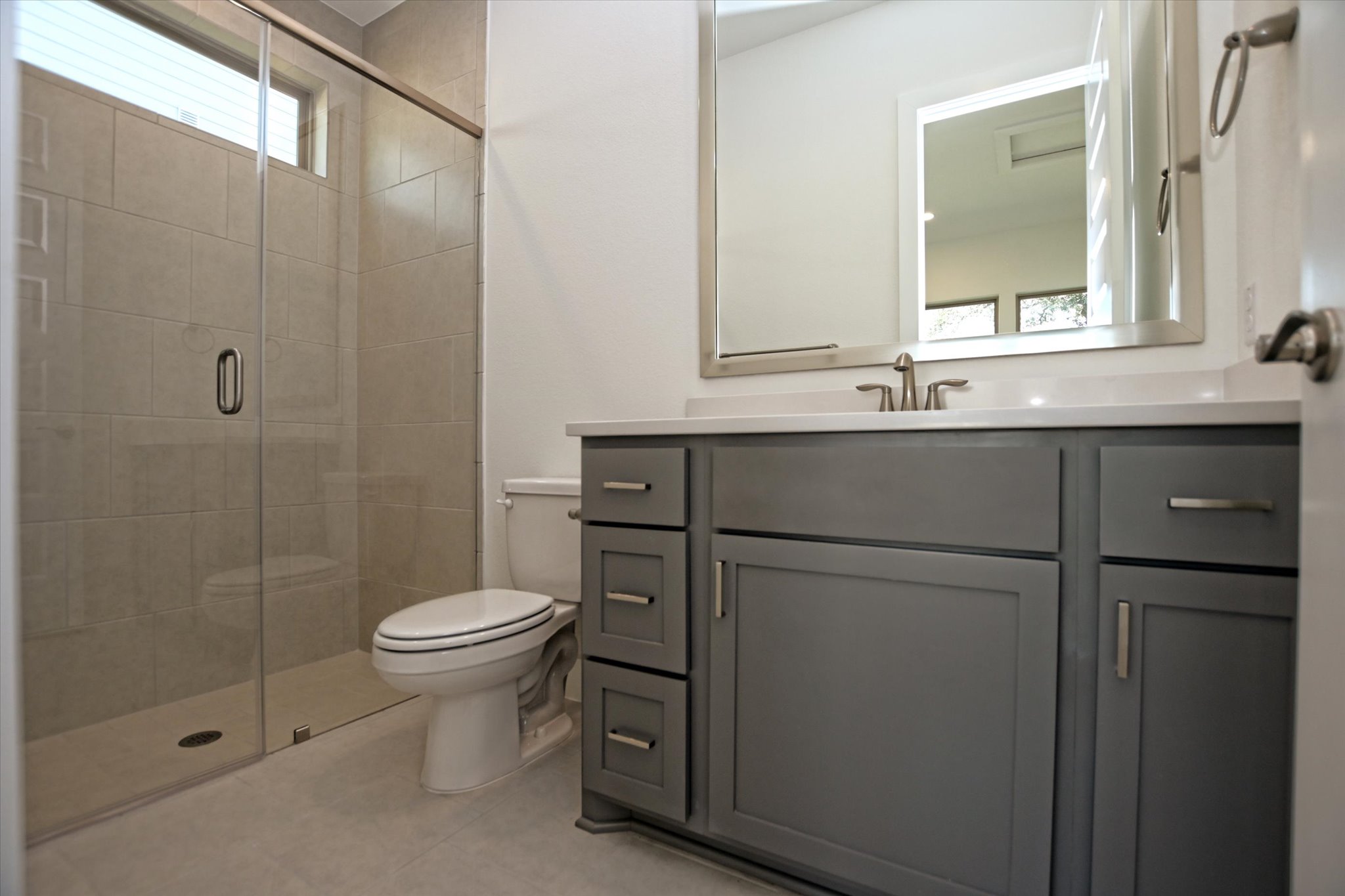 1209 Stormy Drive Georgetown, TX 78628 - Photo 26 of 38 a bathroom with a sink toilet and shower