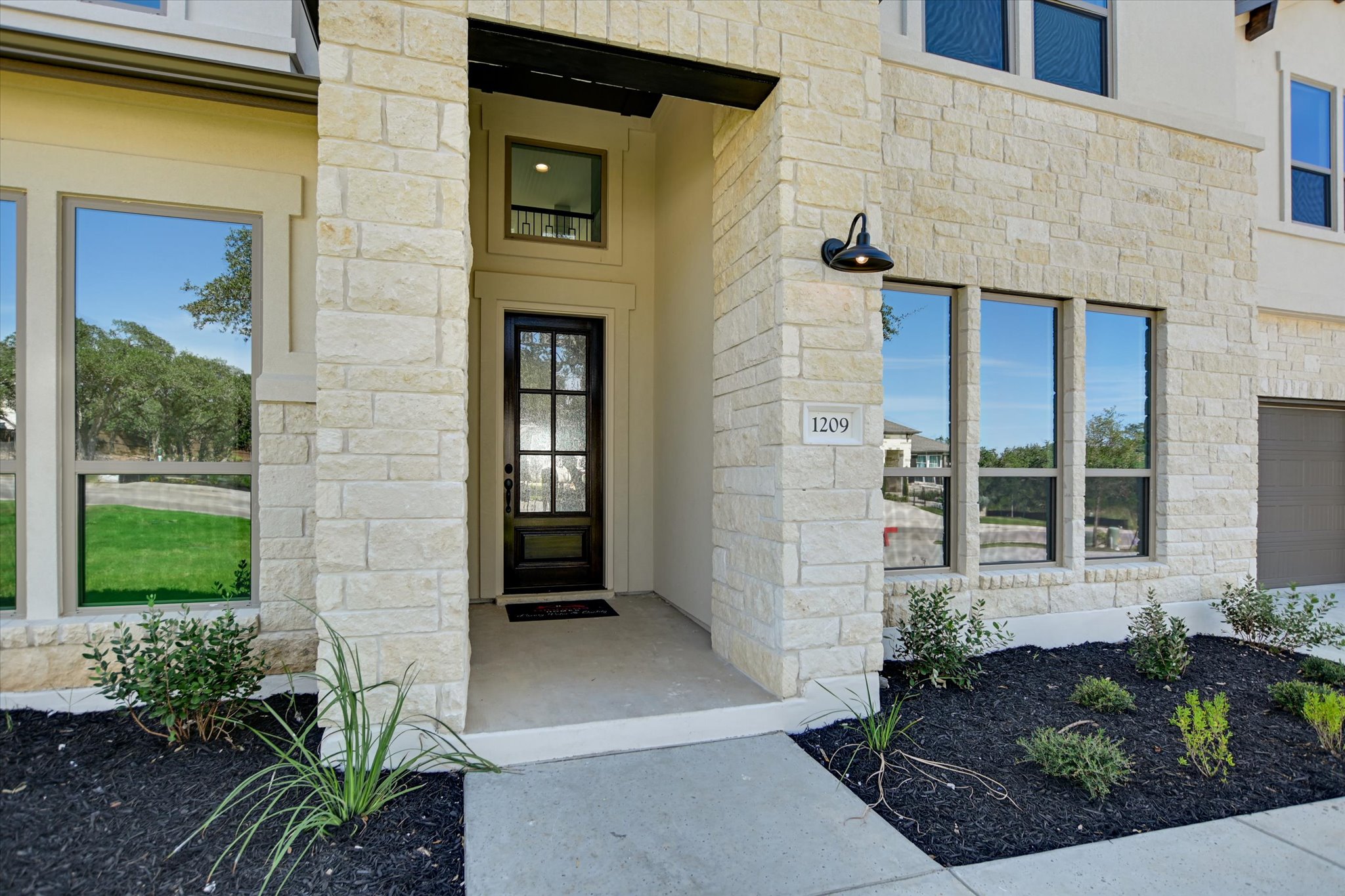 1209 Stormy Drive Georgetown, TX 78628 - Photo 3 of 38 a front view of a house with a yard