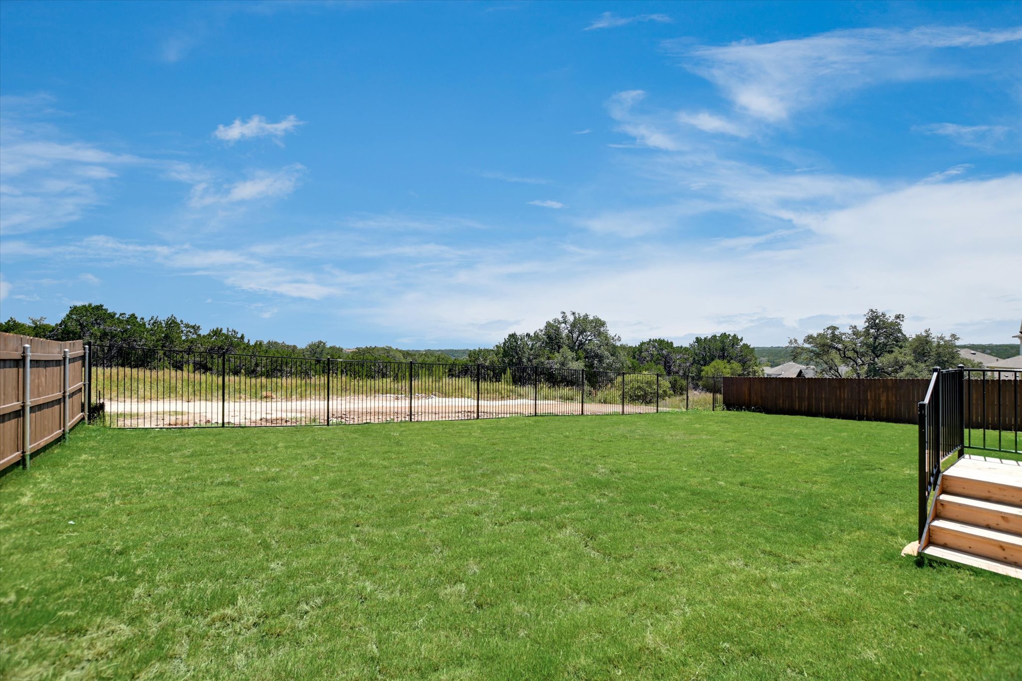 1209 Stormy Drive Georgetown, TX 78628 - Photo 37 of 38 a view of a golf course with a lake