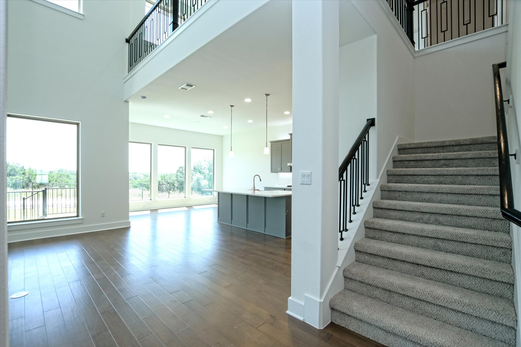 1209 Stormy Drive Georgetown, TX 78628 - Photo 5 of 38 a view of entryway and hall with wooden floor