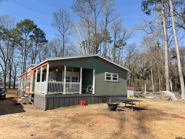 a view of outdoor space with lots of trees