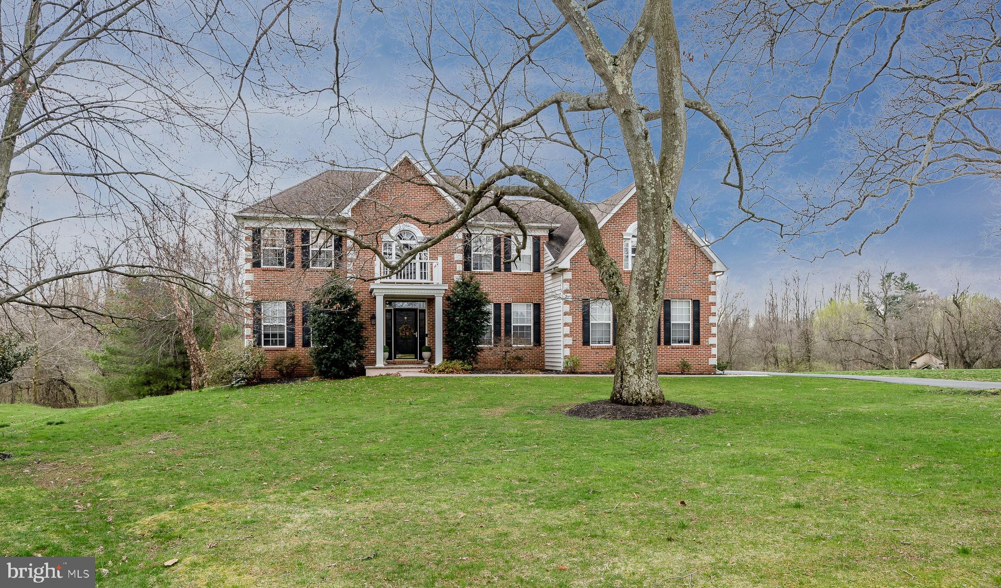 Brick Front with stamped concrete walkway
