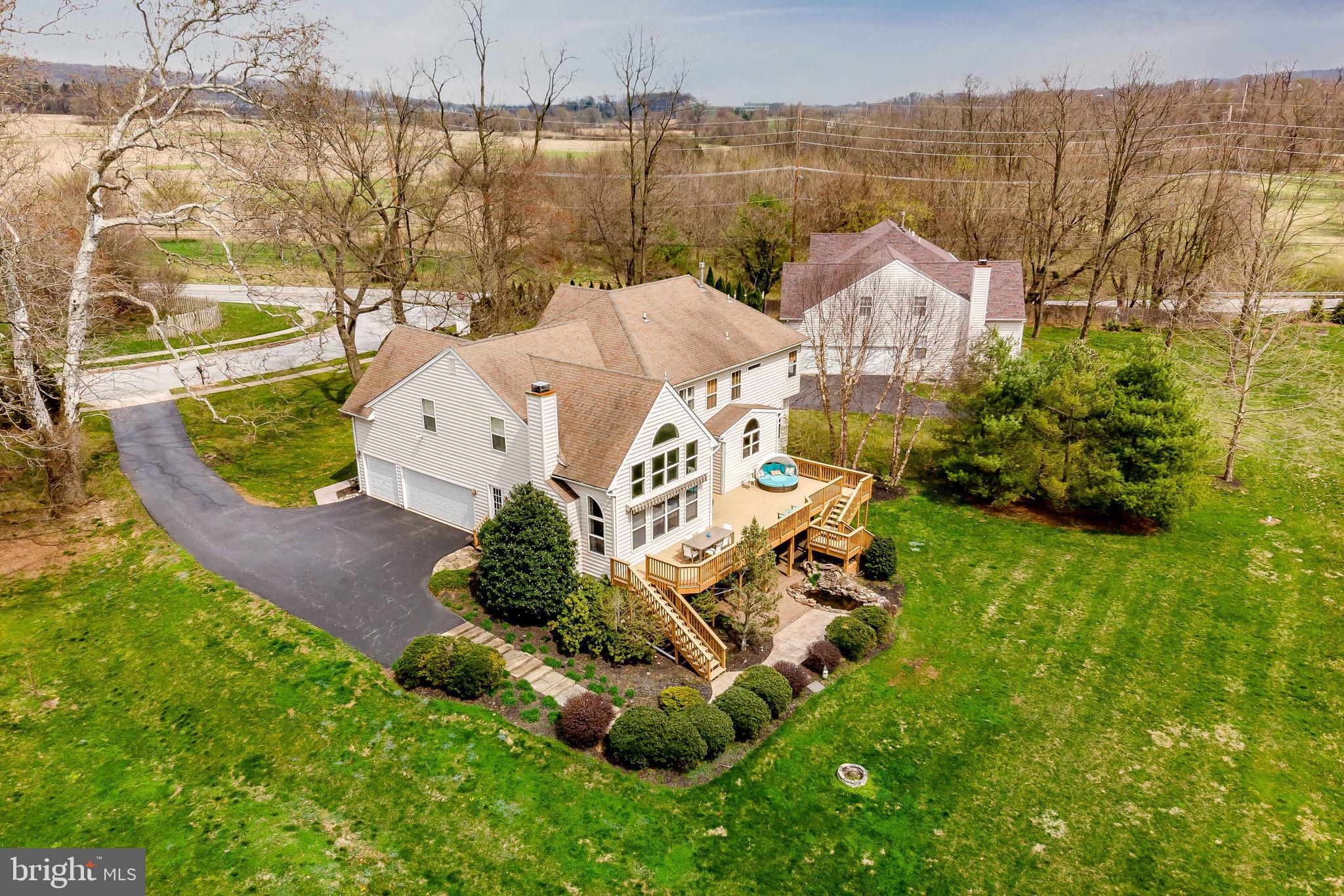 202 Green Valley Road Exton, PA 19341 - Photo 30 of 32 WOW! Look at the gorgeous deck and landscaping