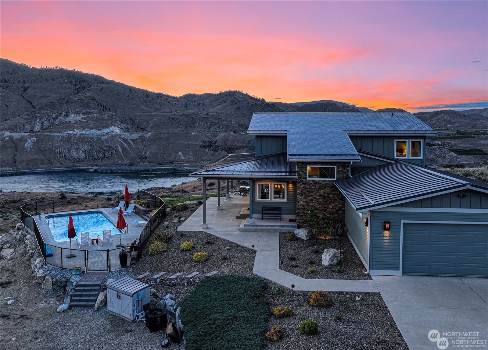 200 Ridge Road Orondo, WA 98843 - Photo 1 of 40 a view of a chairs and table in backyard