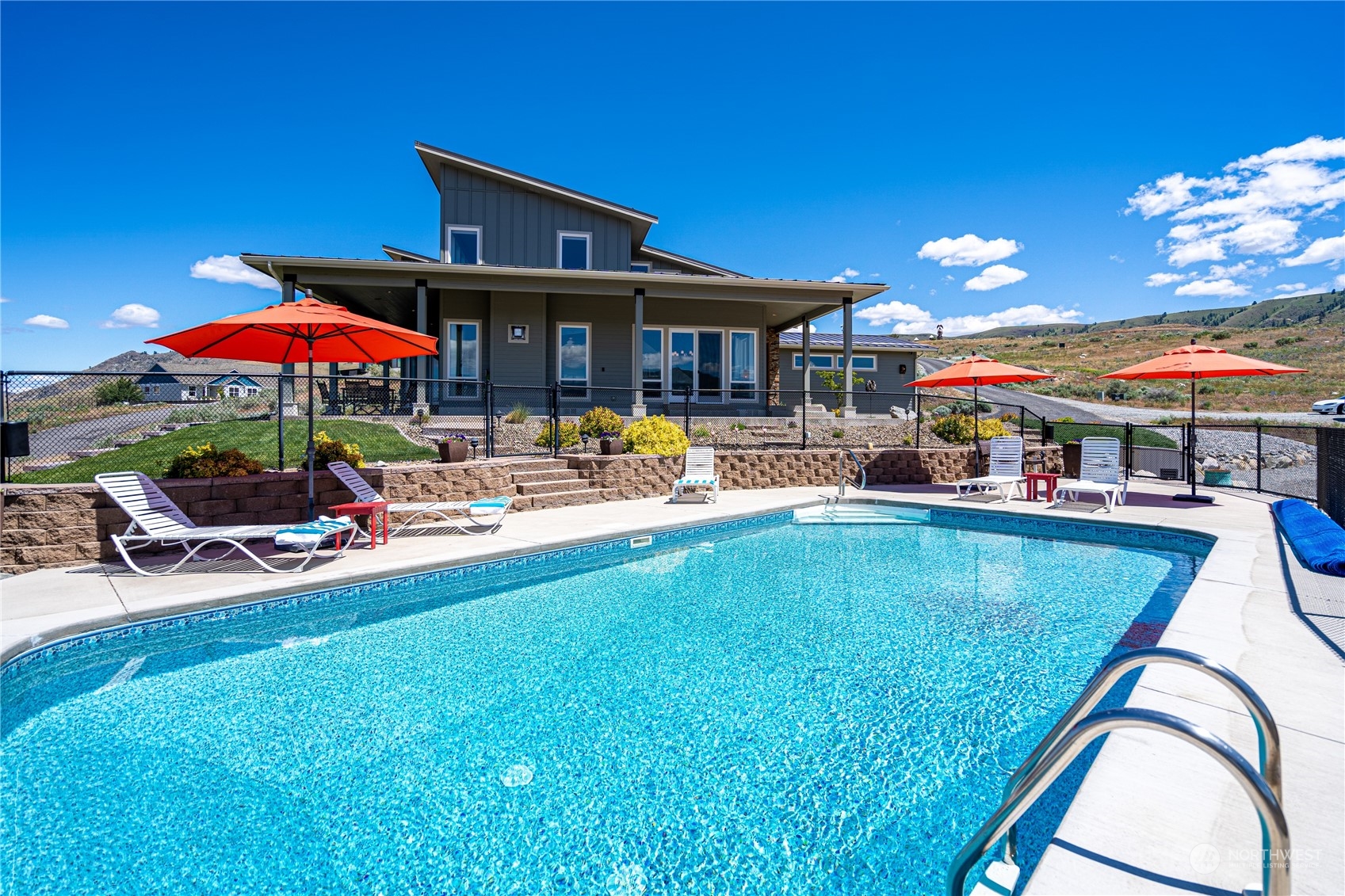 200 Ridge Road Orondo, WA 98843 - Photo 2 of 40 an outdoor space with patio furniture and potted plants