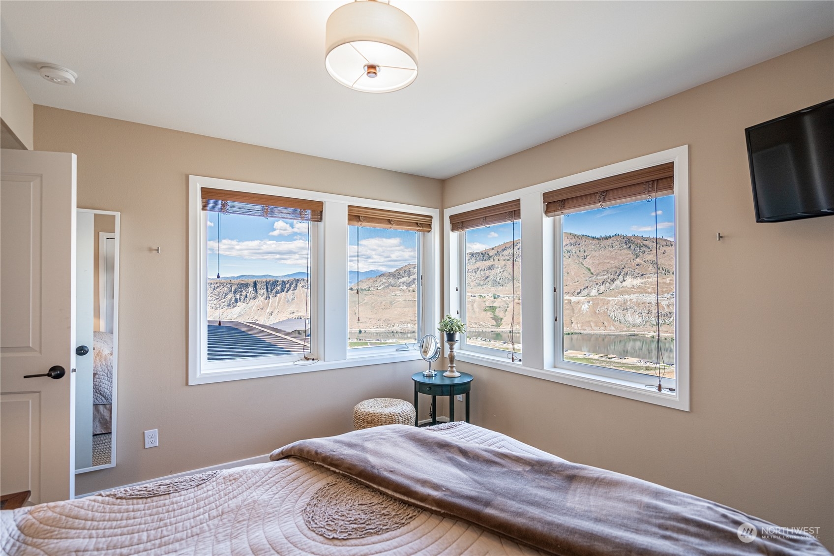 200 Ridge Road Orondo, WA 98843 - Photo 24 of 40 a bedroom with a bed and a window