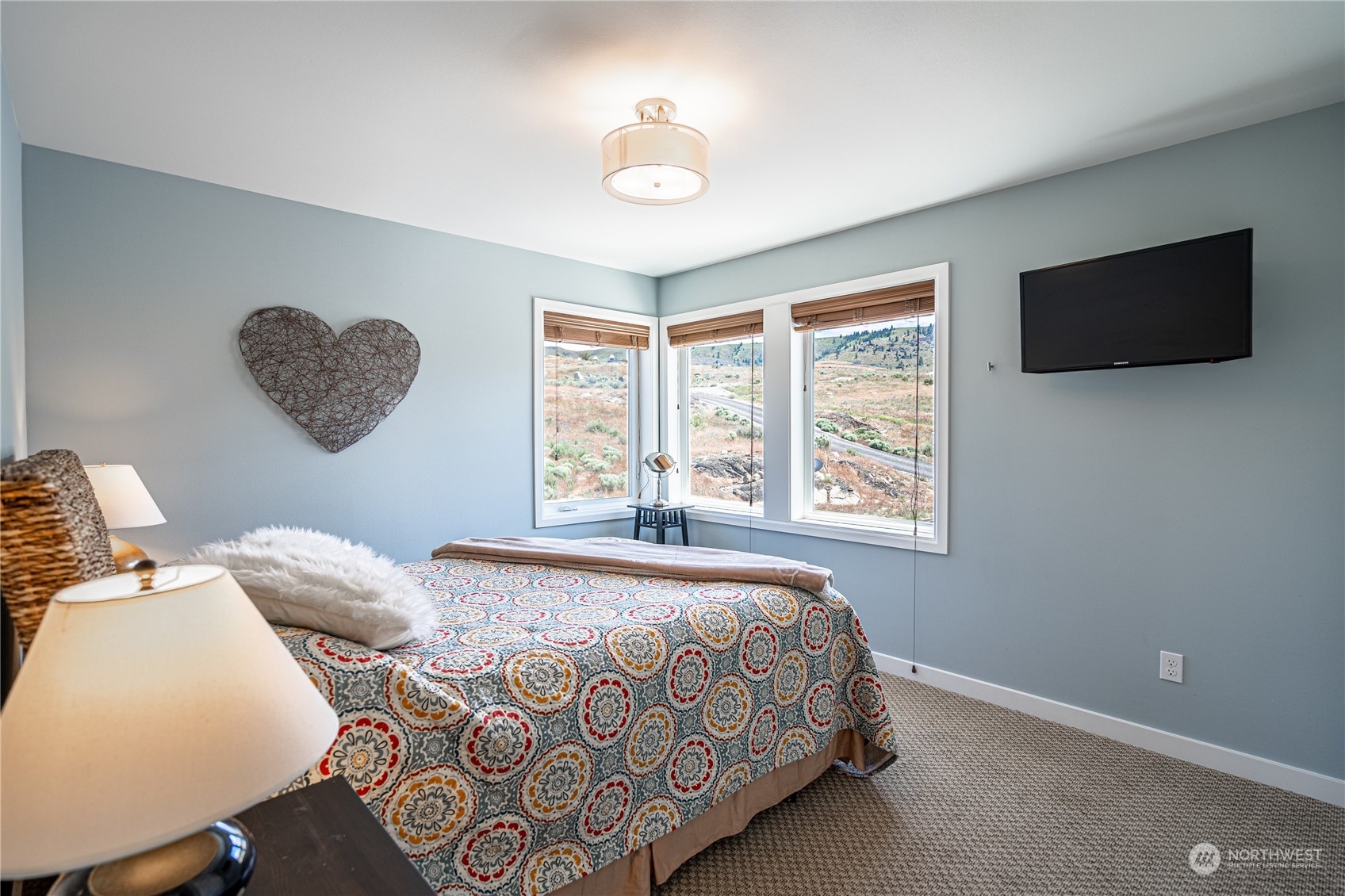 200 Ridge Road Orondo, WA 98843 - Photo 25 of 40 a bedroom with a bed and a window