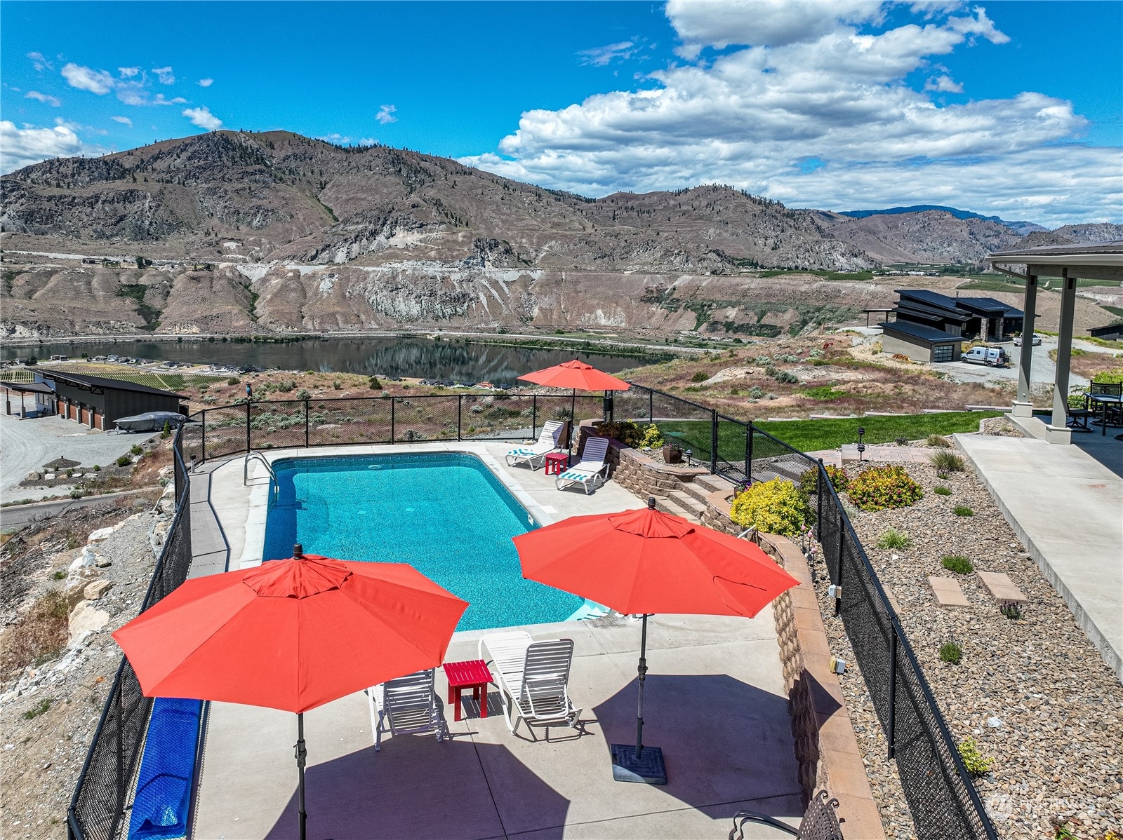 200 Ridge Road Orondo, WA 98843 - Photo 29 of 40 an outdoor space with furniture and umbrella