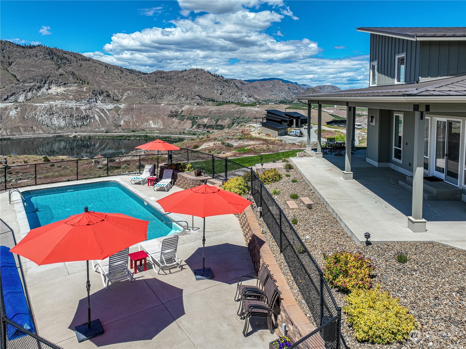 200 Ridge Road Orondo, WA 98843 - Photo 3 of 40 a view of a balcony with table and chairs