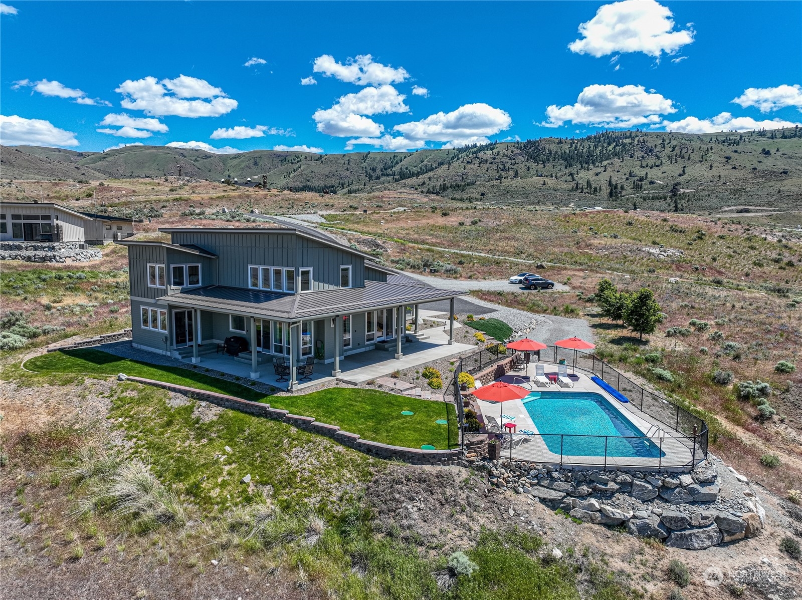 200 Ridge Road Orondo, WA 98843 - Photo 33 of 40 a view of a house with a yard