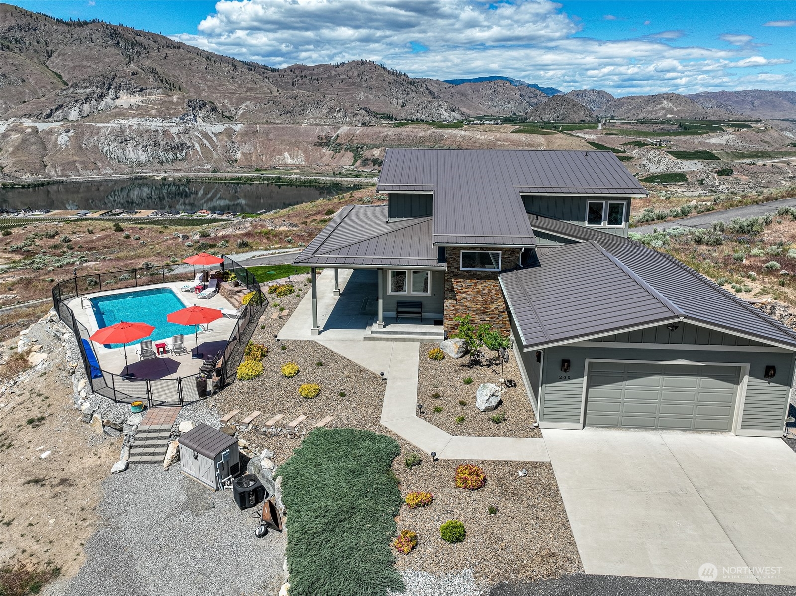 200 Ridge Road Orondo, WA 98843 - Photo 34 of 40 an aerial view of a house with a garden
