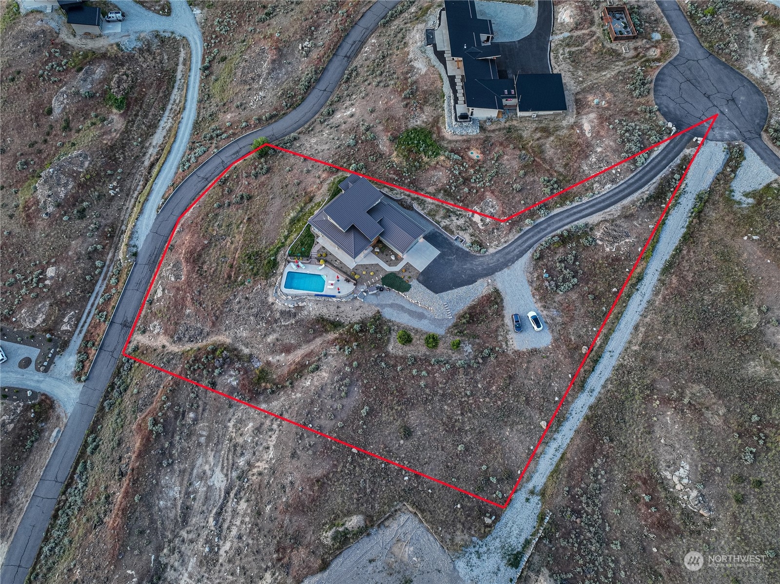 200 Ridge Road Orondo, WA 98843 - Photo 37 of 40 a bed with a book and a bed