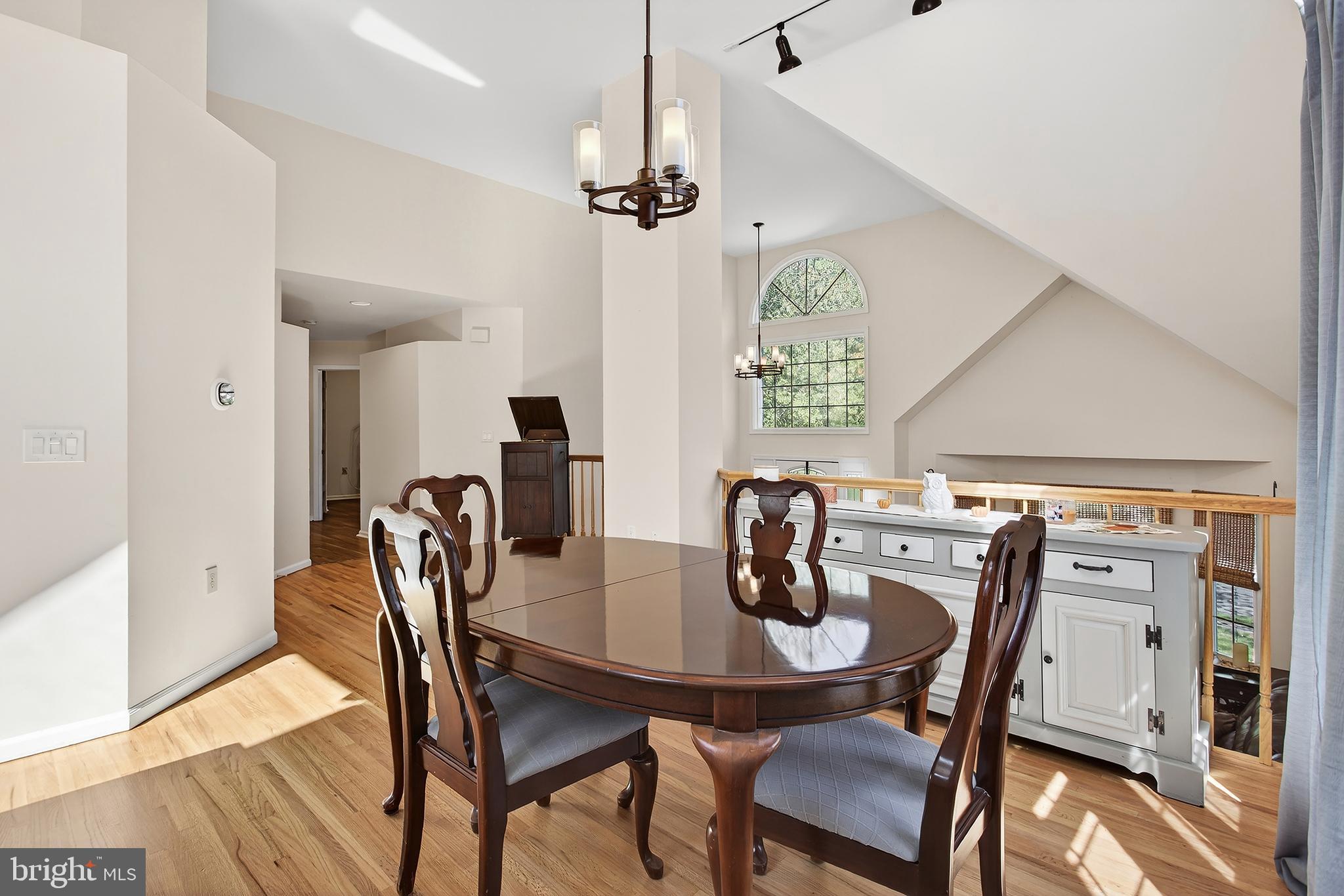17 Elm Street Hopewell, NJ 08525 - Photo 12 of 52 a view of a dining room with furniture and a chandelier