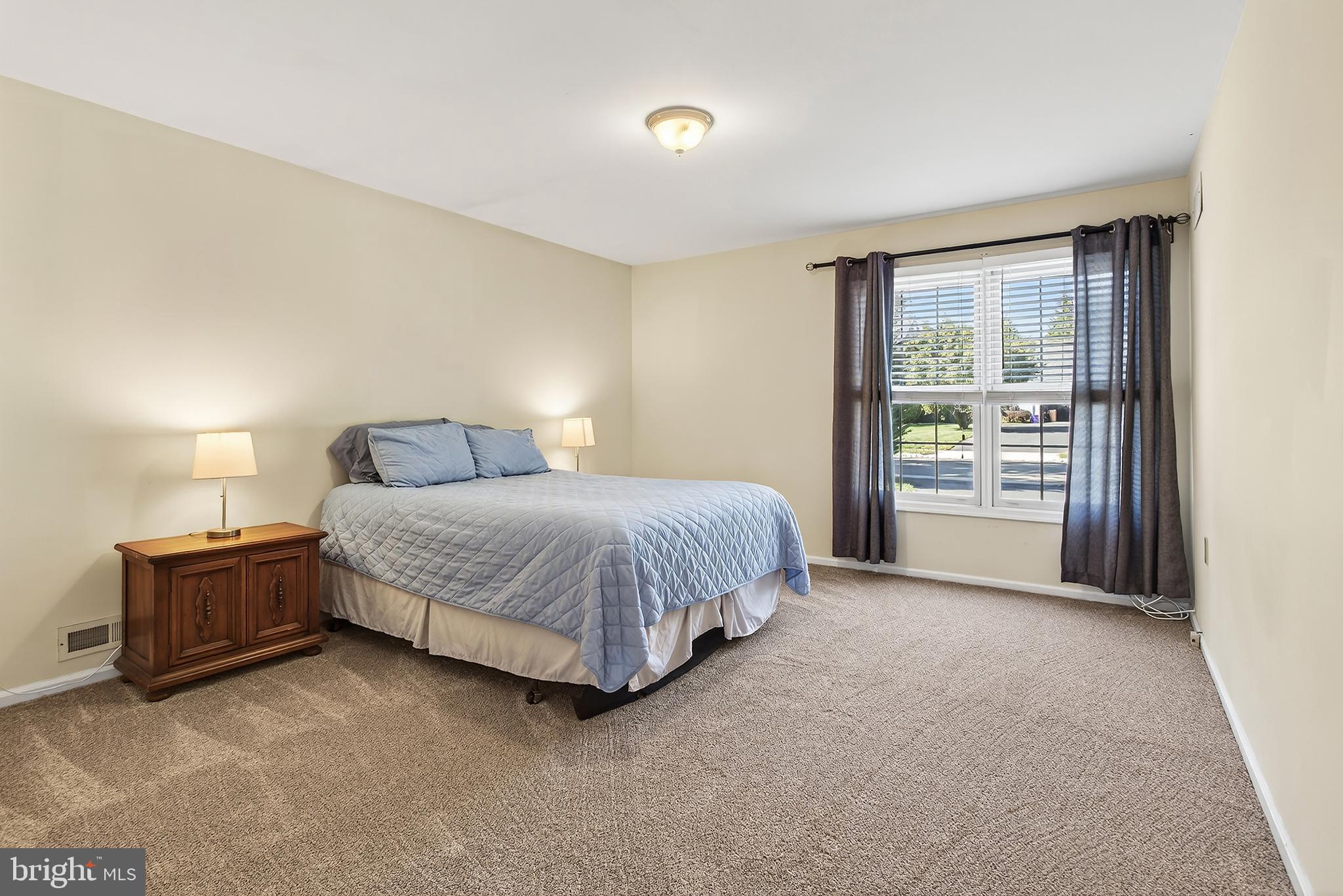 17 Elm Street Hopewell, NJ 08525 - Photo 42 of 52 a bedroom with a bed and with a large window