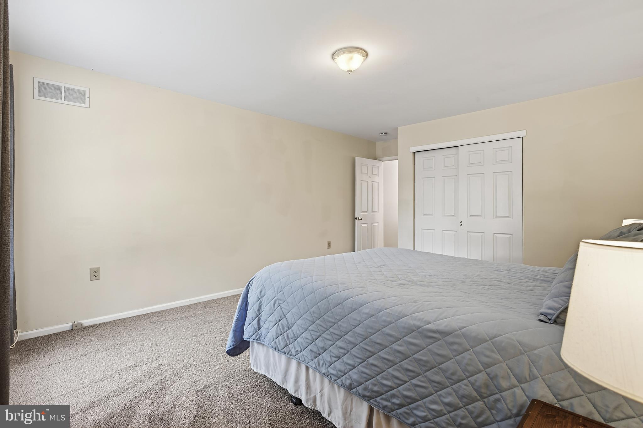 17 Elm Street Hopewell, NJ 08525 - Photo 43 of 52 a bedroom with a bed and cabinets