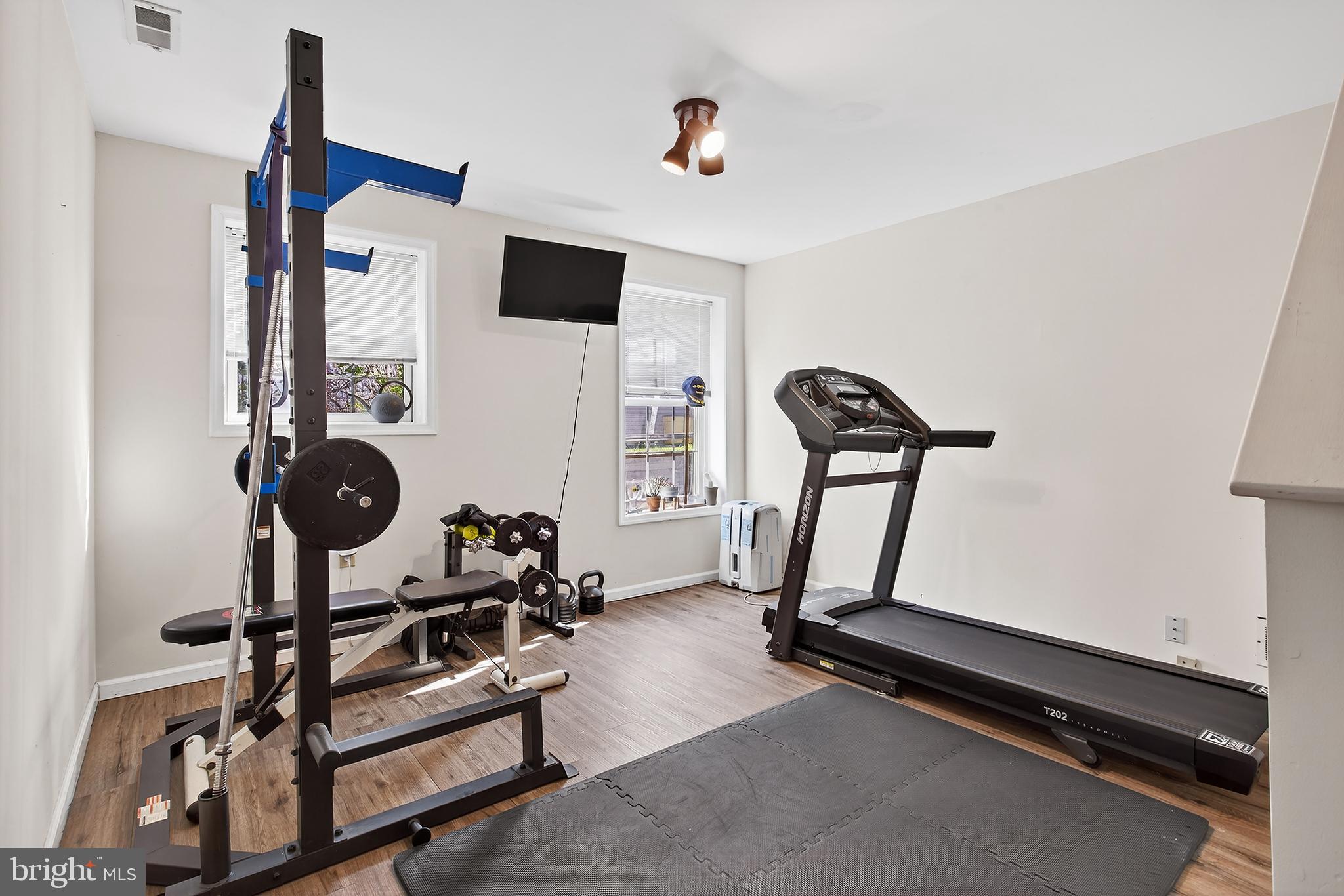 17 Elm Street Hopewell, NJ 08525 - Photo 44 of 52 a room with gym equipment and windows