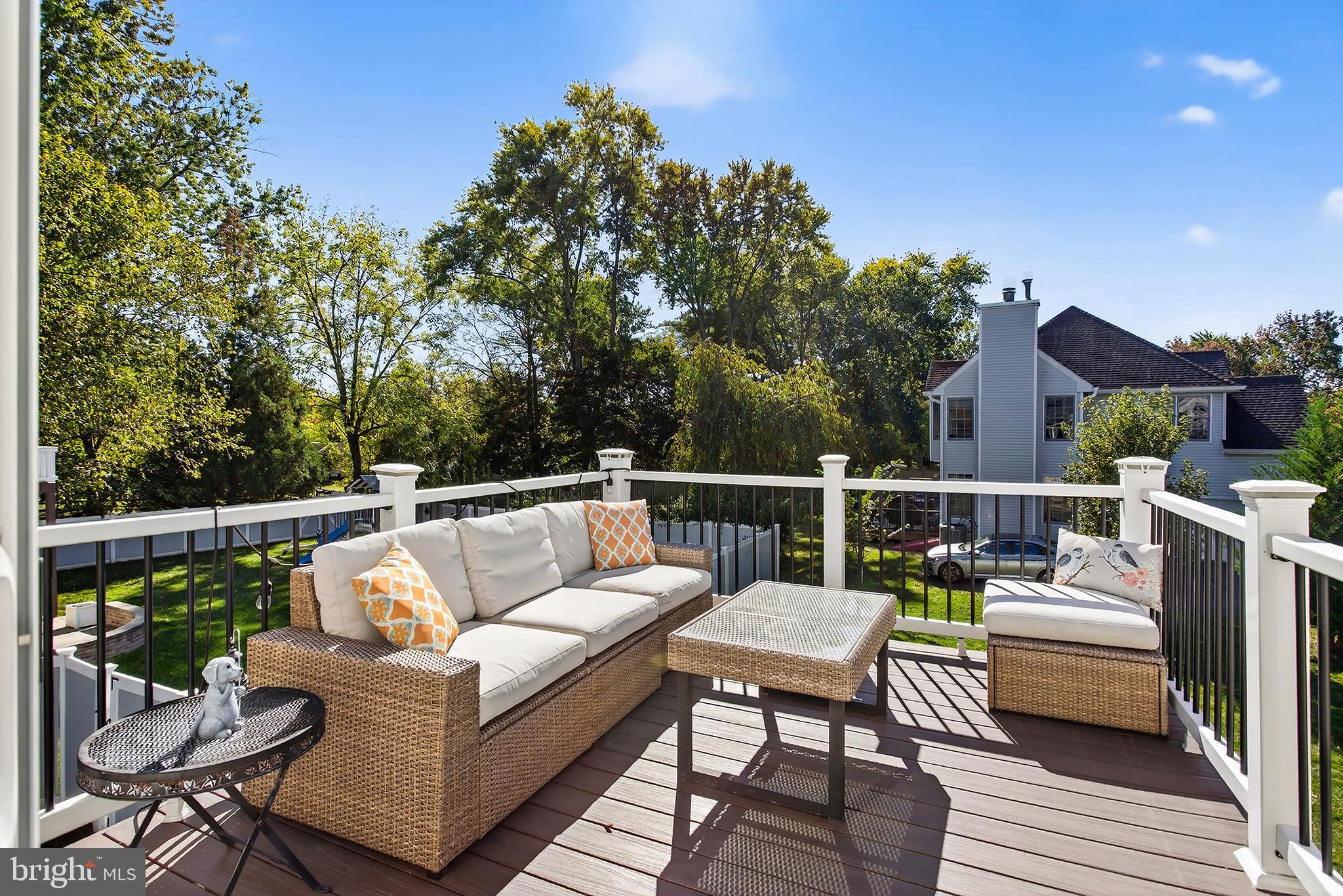 17 Elm Street Hopewell, NJ 08525 - Photo 46 of 52 a balcony with wooden floor and outdoor seating