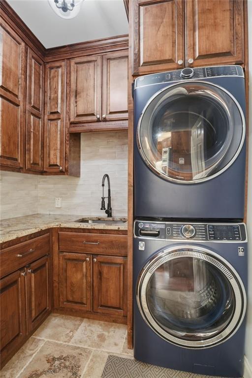 2950 Callie Still Road Lawrenceville, GA 30045 - Photo 22 of 77 a utility room with sink dryer and washer
