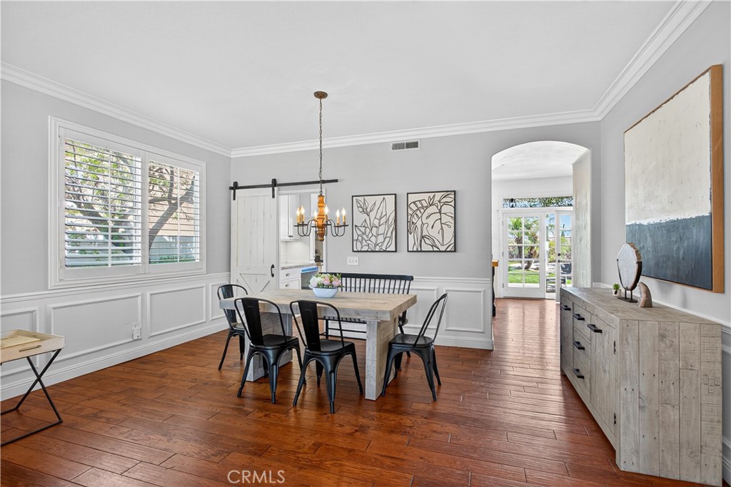 31928 Cercle Chambertin Temecula, CA 92591 - Photo 22 of 74 a view of a dining room with furniture window and wooden floor